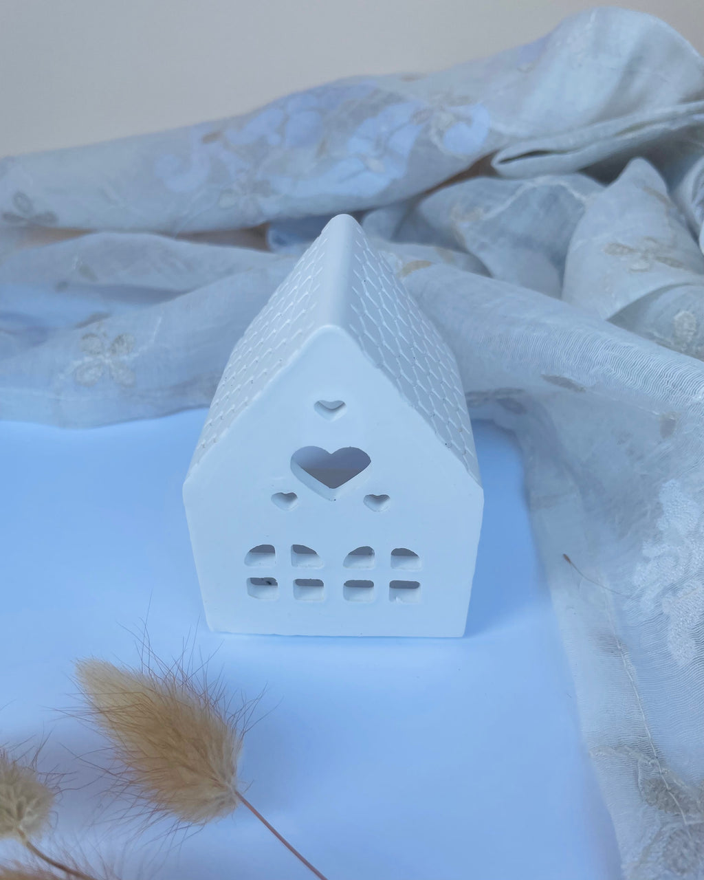 Casa portavelas pequeña