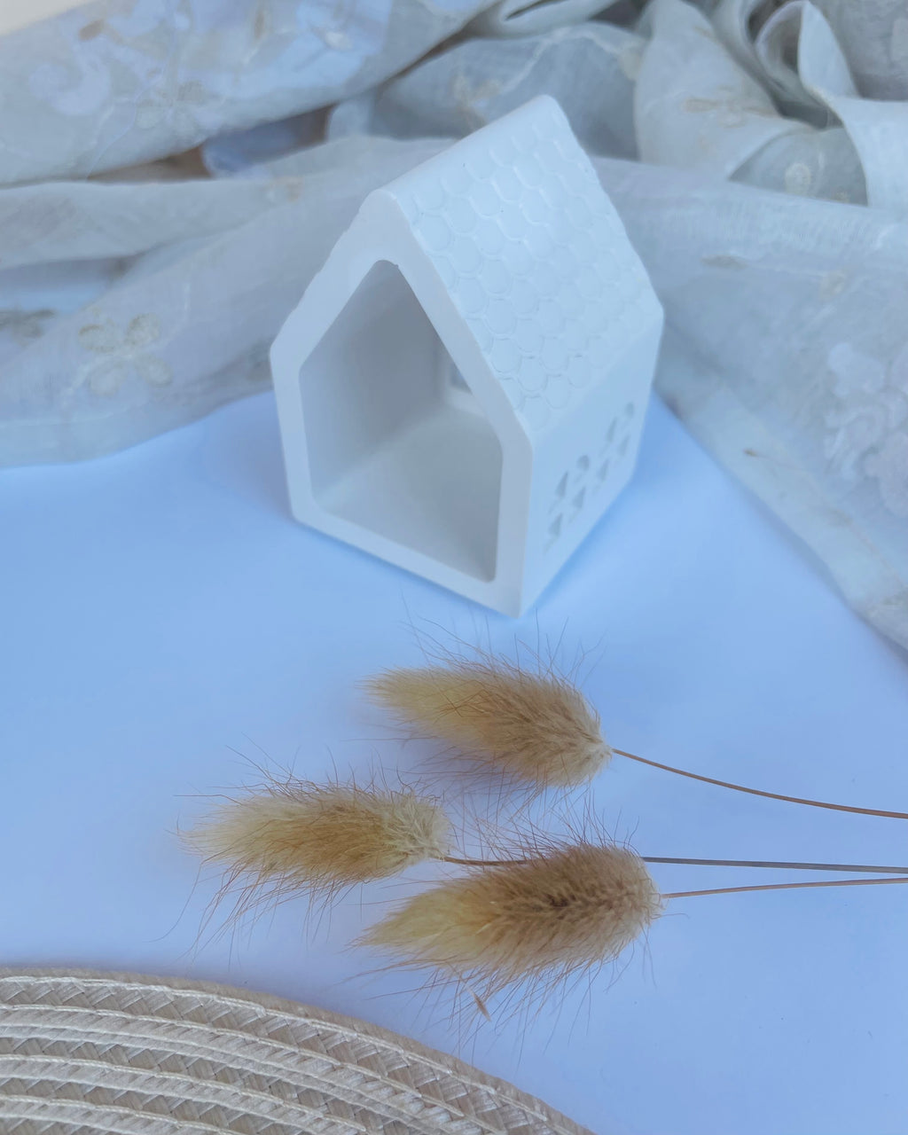 Casa portavelas pequeña