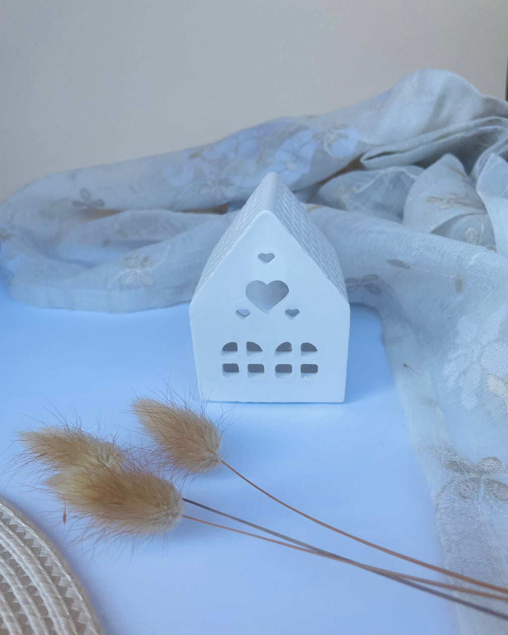 Casa portavelas pequeña